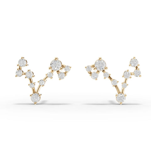 18K gold earrings featuring a Pisces constellation design, set with round lab-grown diamonds in a linear layout.