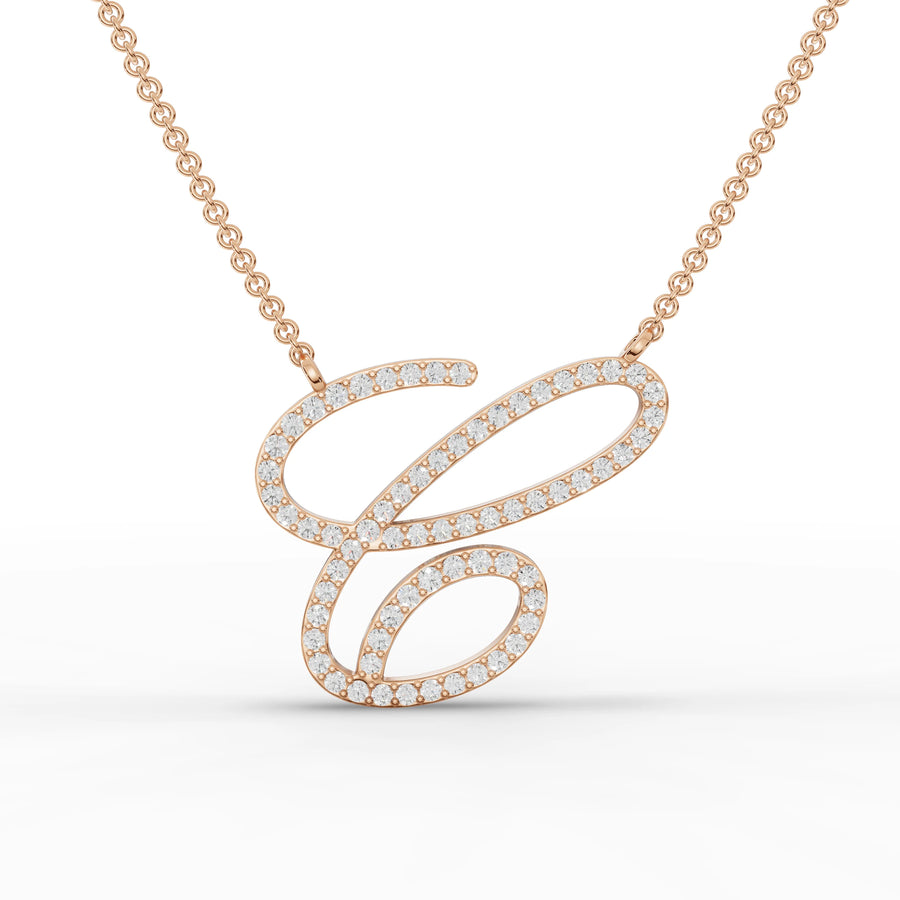 Round initial pendant in rose gold, featuring a sparkling lab-grown diamond 'C', set in a stylish cursive design.