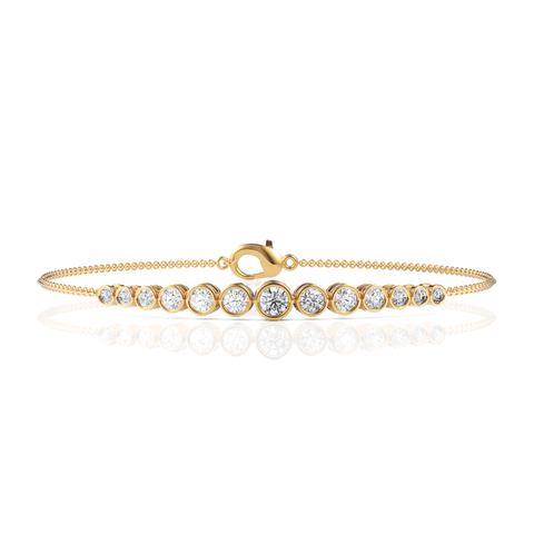 Elegant 0.76 Ct round bezel lab diamond bracelet features graduated diamonds set in an 18k gold chain with a lobster clasp.