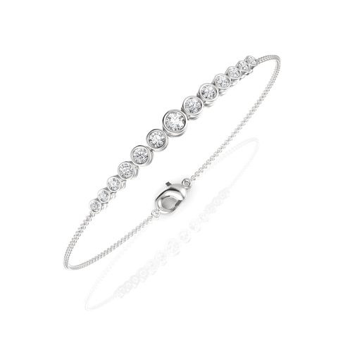 Elegant 0.76 Ct round bezel lab diamond bracelet with graduated diamonds, set in a slender 18k gold chain.