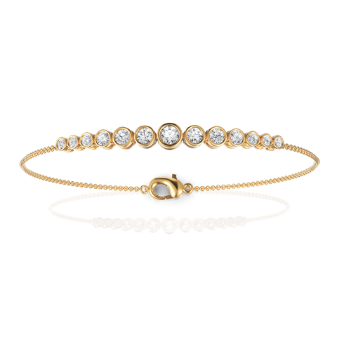 Delicate 0.76 Ct round bezel lab diamond bracelet in 18k gold, featuring graduated diamonds with a lobster clasp.