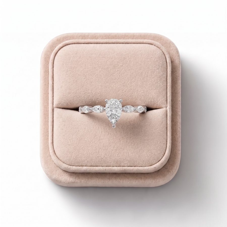 0.81 CT Pear Lab Grown Diamond Marquise Side Stone Ring, on a white background