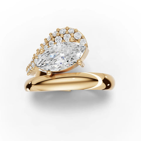 Lab-grown marquise swirl ring yellow gold close-up