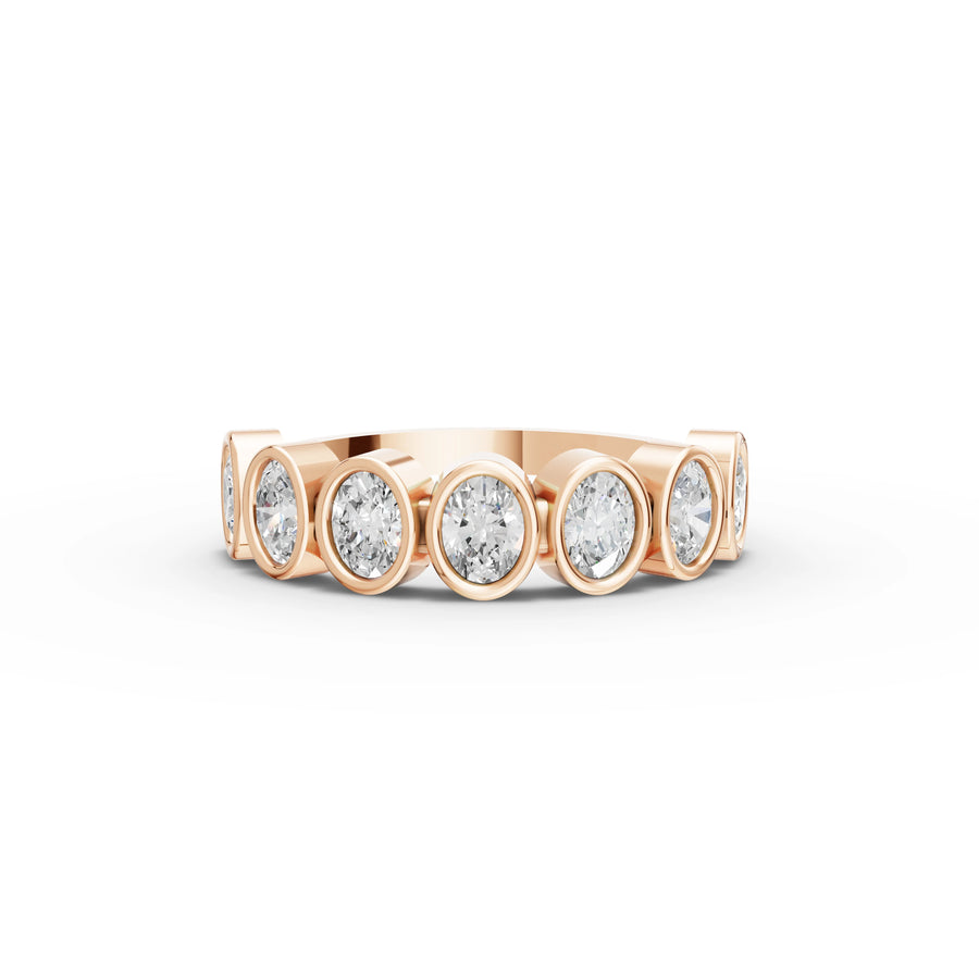 0.95 CT Oval Bezel Half Eternity Lab Grown Diamond Ring in rose gold
