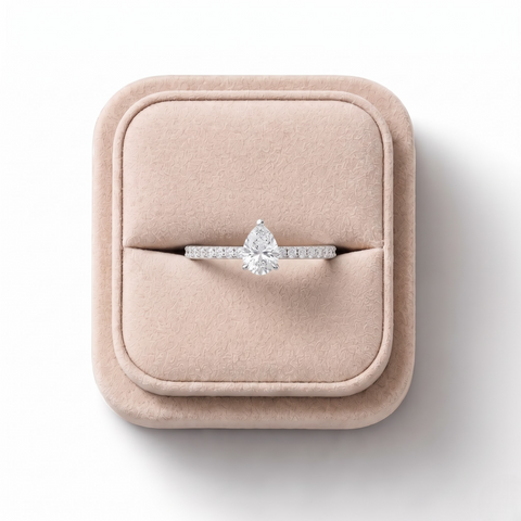 0.98 CT Pear Hidden Halo Pavé Lab Grown Diamond Ring, on a white background