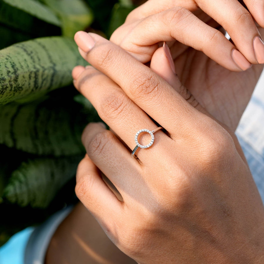 0.11 CT open circle pavé diamond ring worn on hand