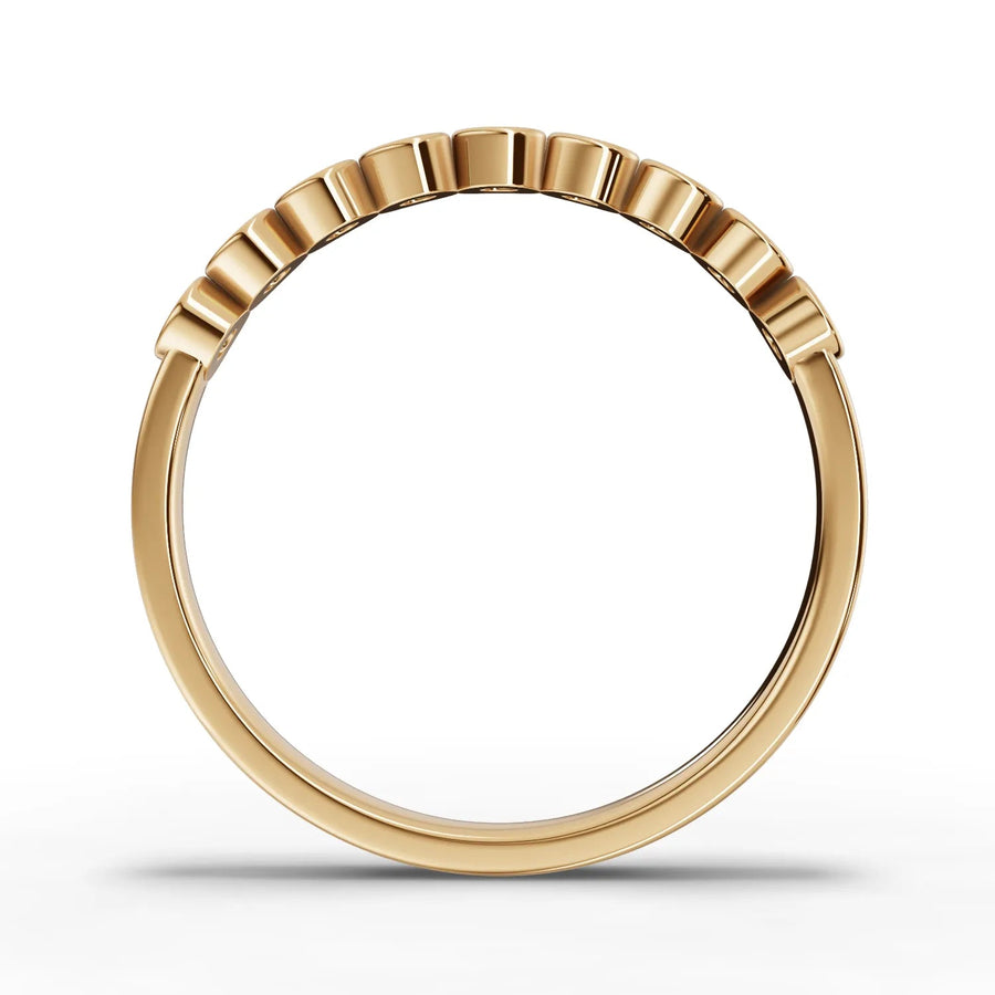 Round cut lab-grown eternity ring yellow gold close-up