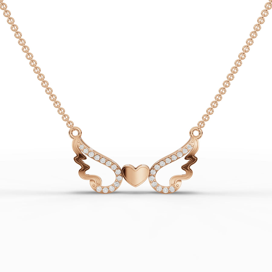 Rose gold heart wing pendant