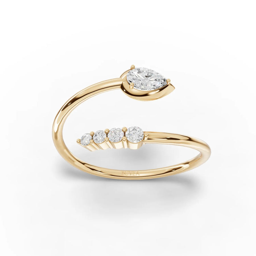 Open-band pear and round diamond ring yellow gold top view