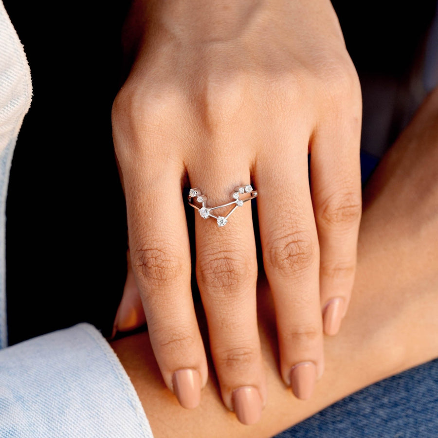 Model wearing Libra constellation ring
