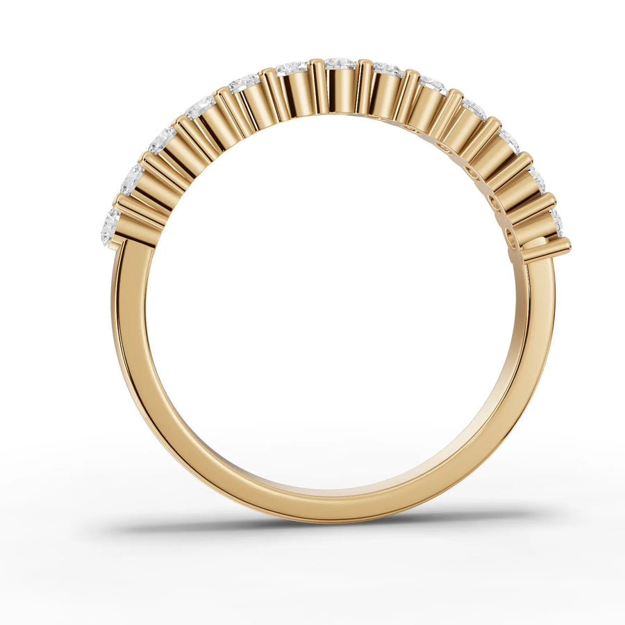 Round cut lab-grown half eternity ring yellow gold close-up