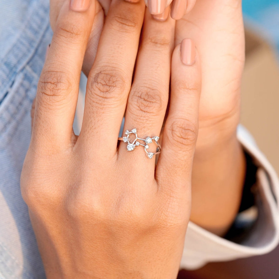 Virgo constellation ring worn on model