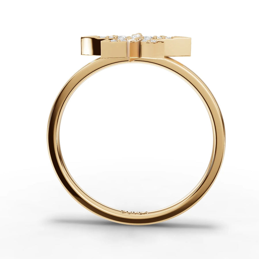 Eight-point star diamond ring yellow gold angled profile