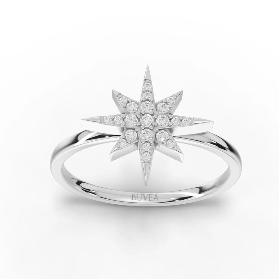 0.30 CT eight-point star lab diamond ring in 18K gold with round diamonds and central cluster
