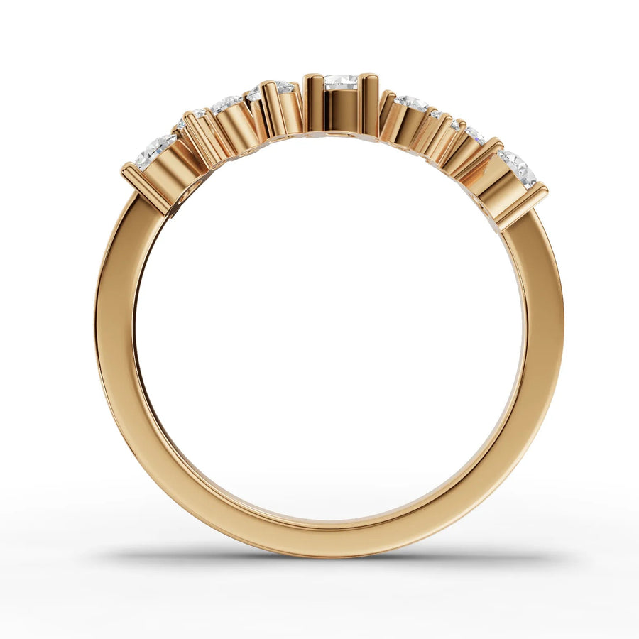 Round cut lab-grown eternity ring yellow gold close-up