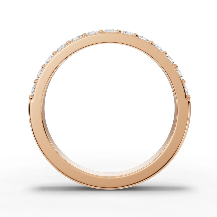 Round cut lab-grown half eternity ring rose gold close-up