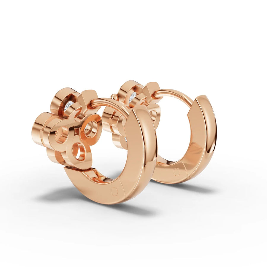 Cluster huggie earrings rose gold angle