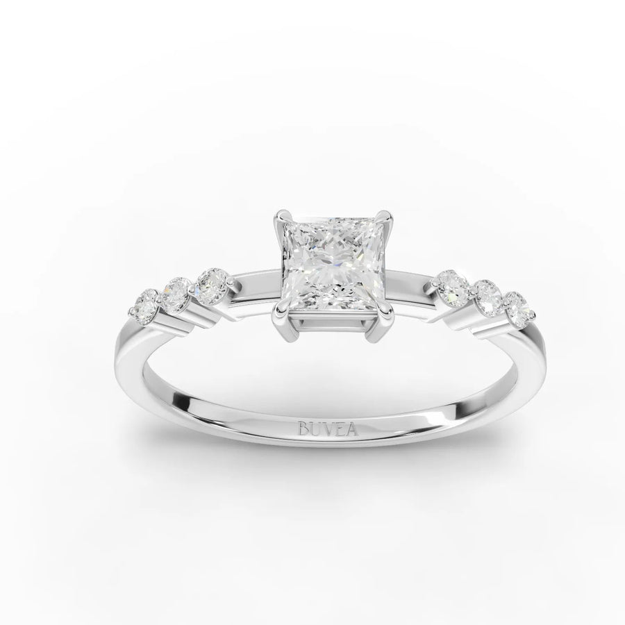 0.50 CT twisted band bar-set lab-grown diamond ring in 18K gold with six round diamonds in a linear top setting
