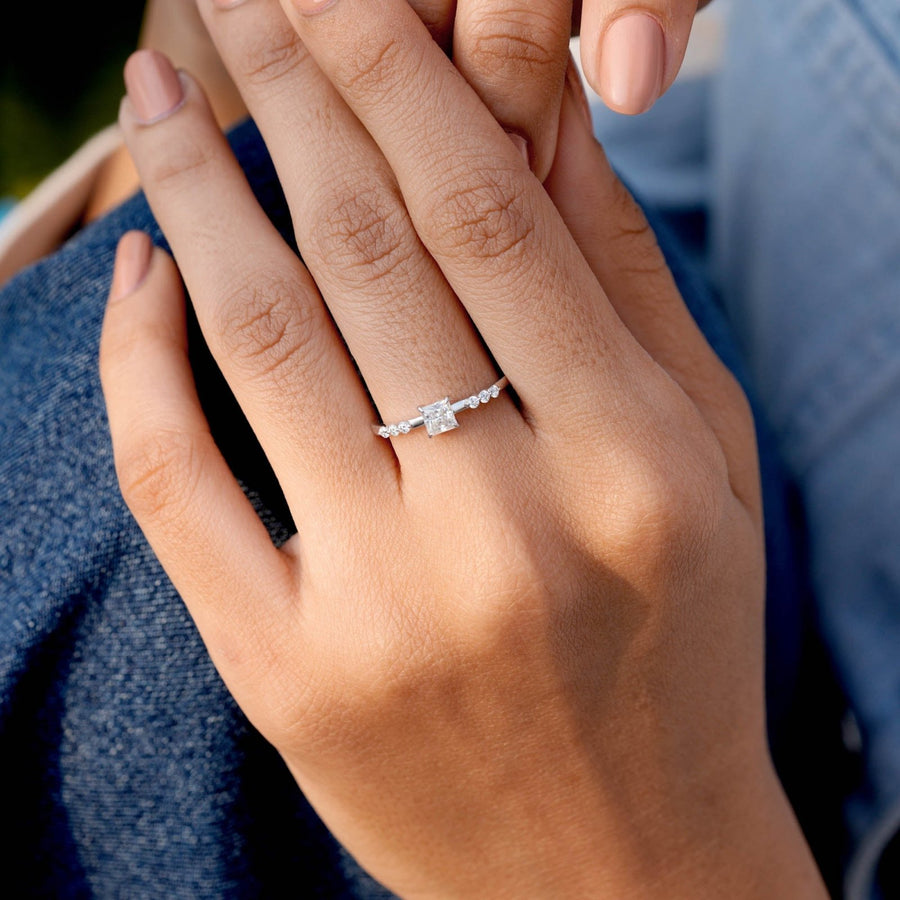 0.50 CT twisted band diamond ring worn on hand