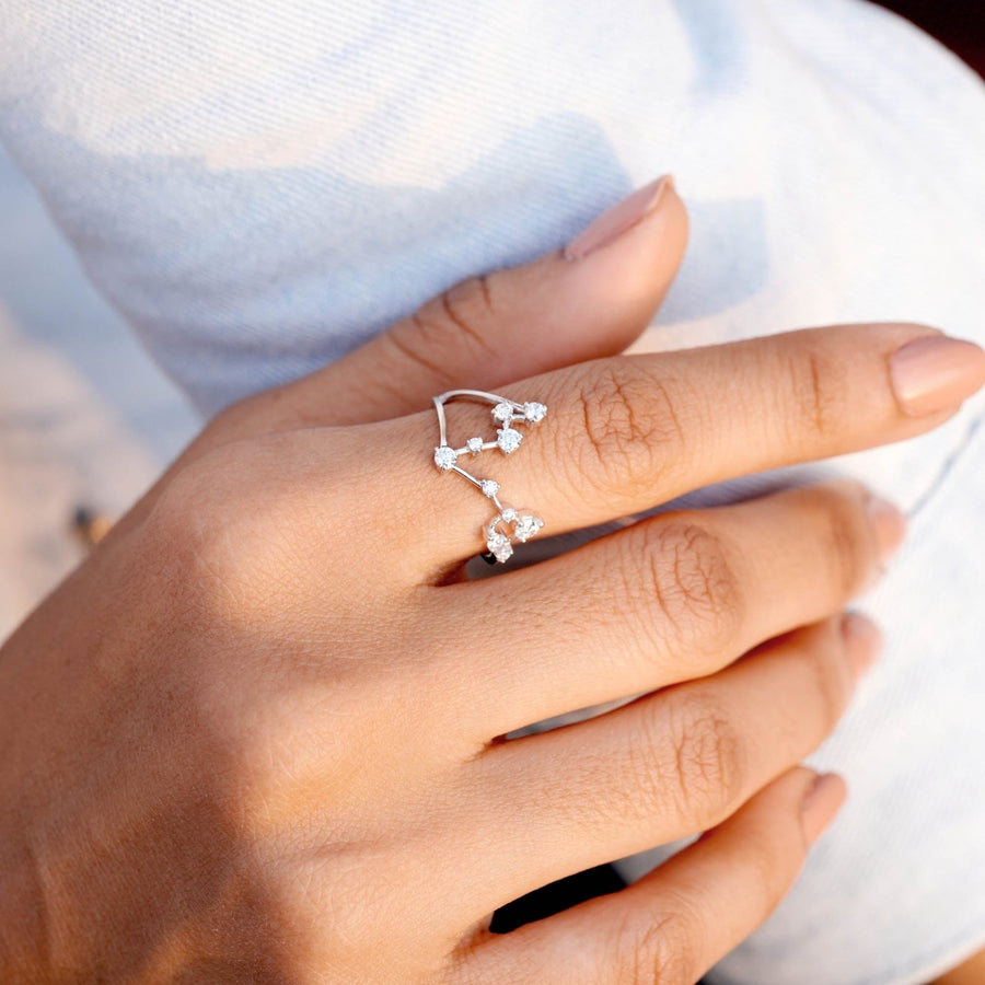Pisces constellation ring worn on hand