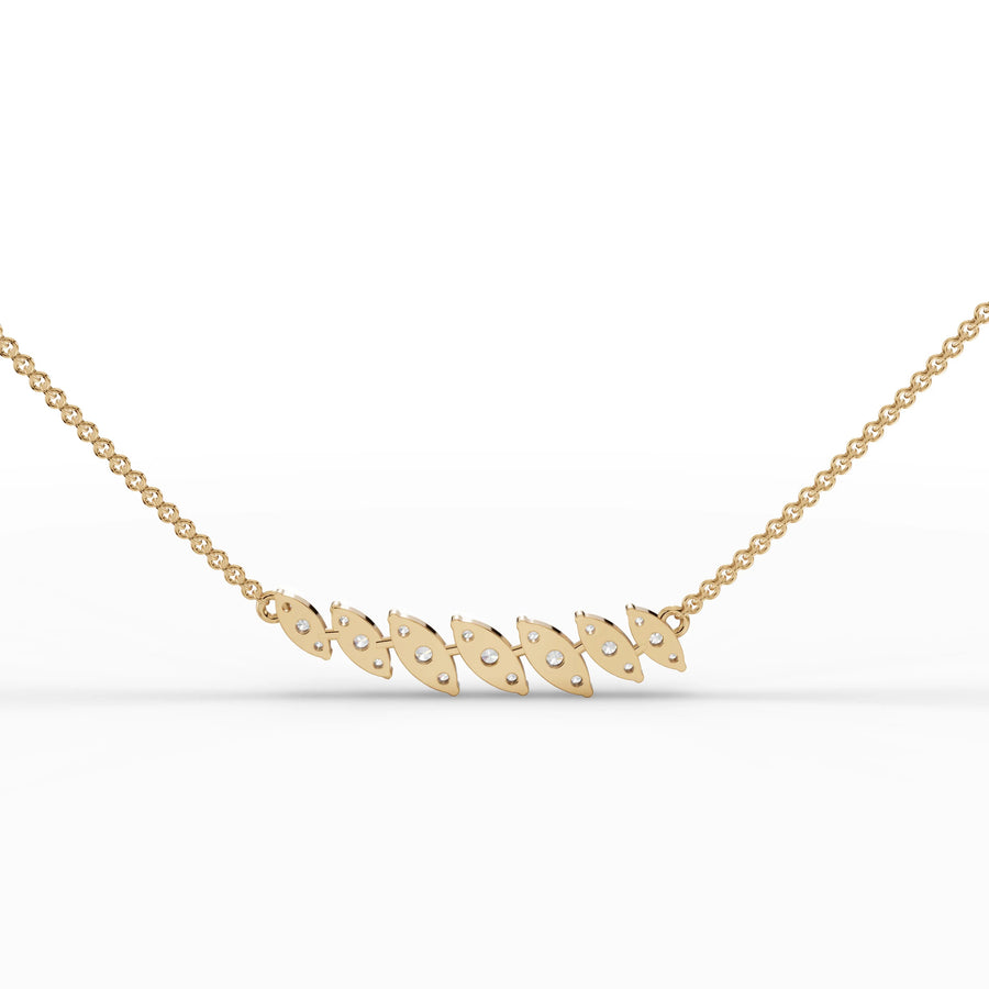 Leaf motif detail in yellow gold