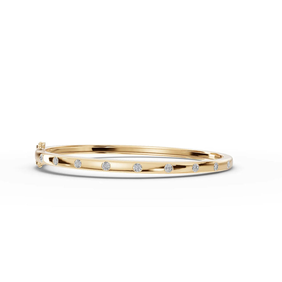 Yellow gold flush-set diamonds close-up