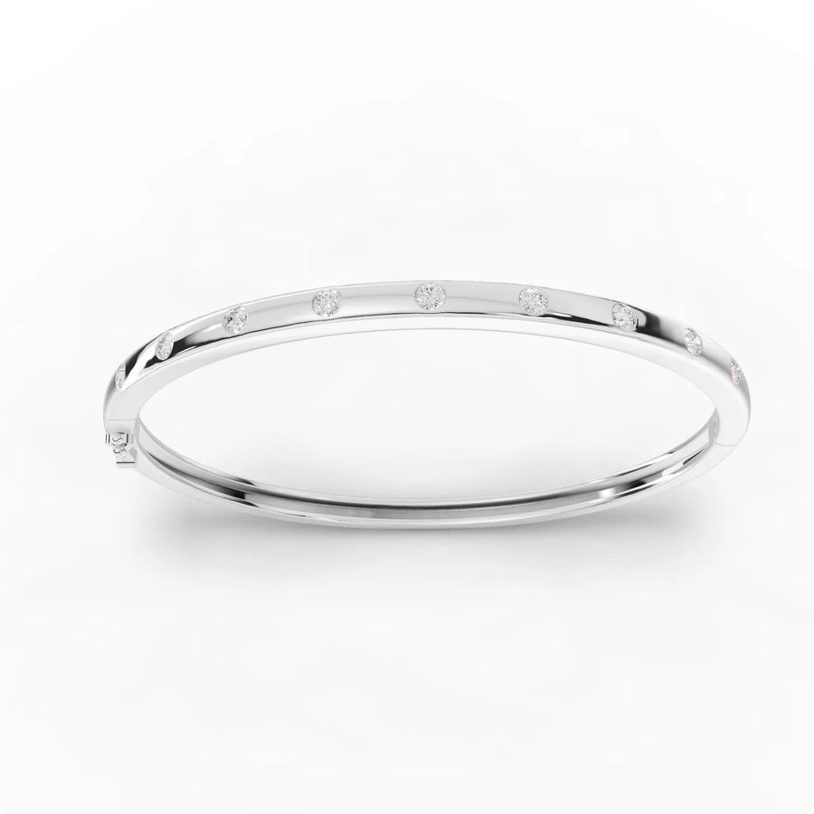 0.54 CT diamond bangle bracelet in 18K gold with round lab-grown bezel-set stations and a slim rigid profile