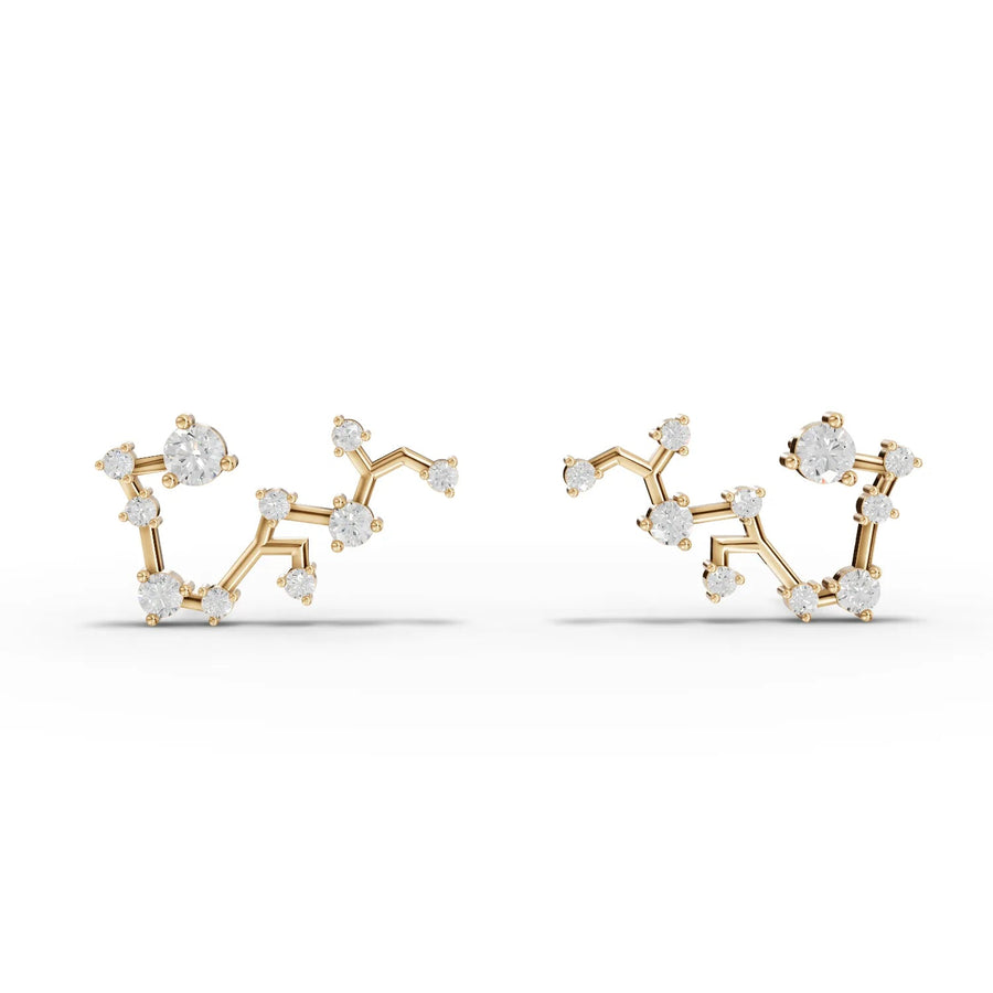 Sagittarius constellation earrings in yellow gold