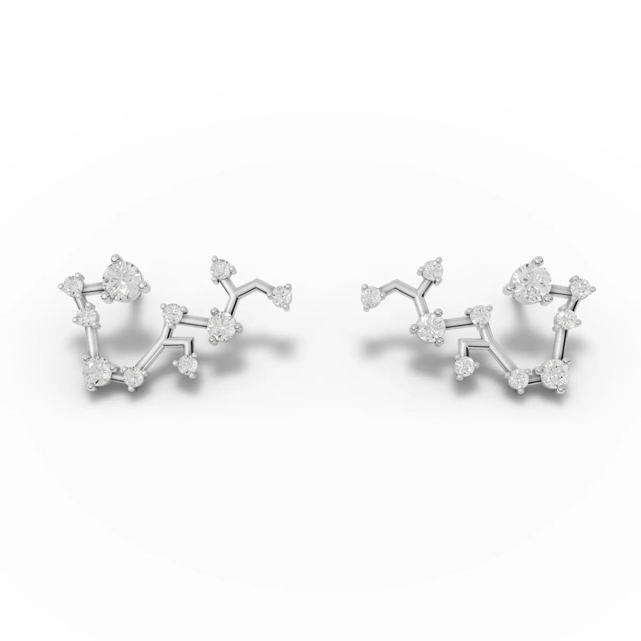 Angled view white gold constellation earrings