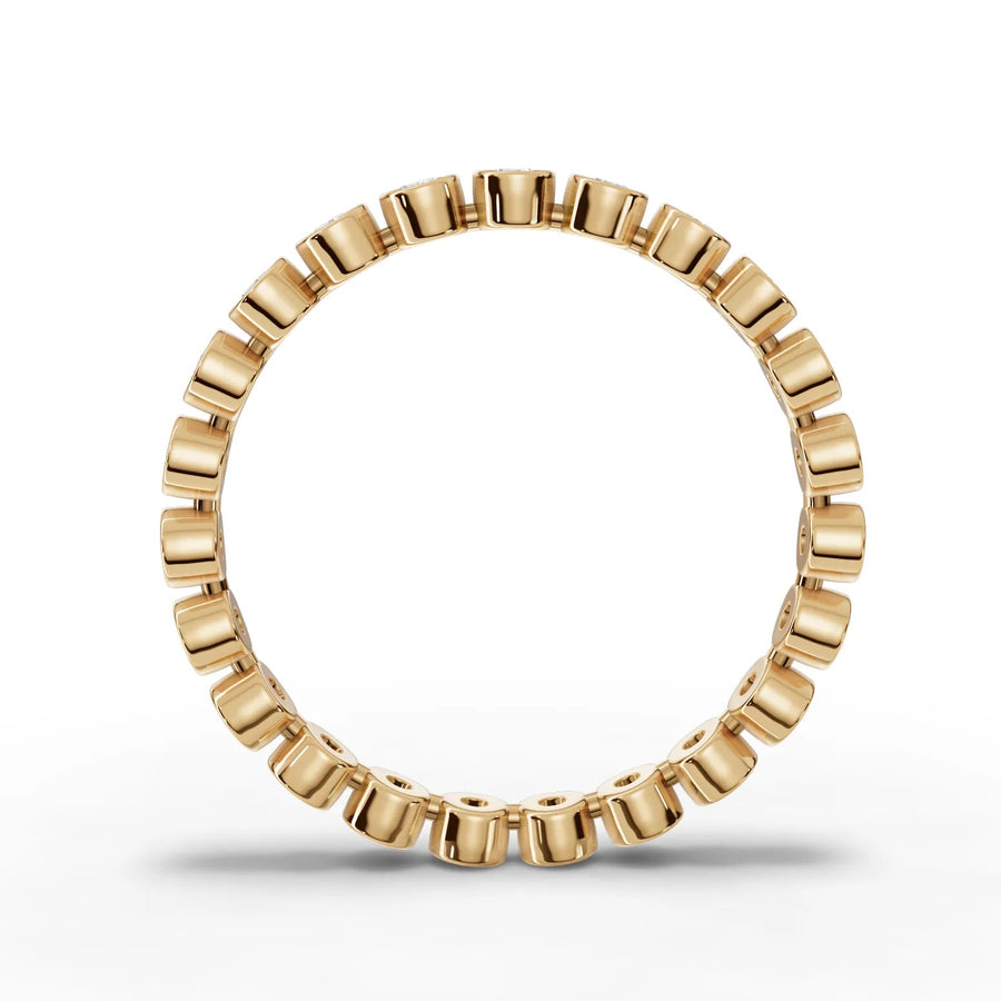 Round cut lab-grown eternity band yellow gold close-up