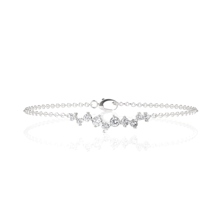 0.50 CT lab diamond station bracelet in 18K gold with round cluster accents and fine chain