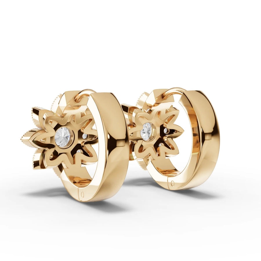 Yellow gold floral diamond huggie earrings close-up