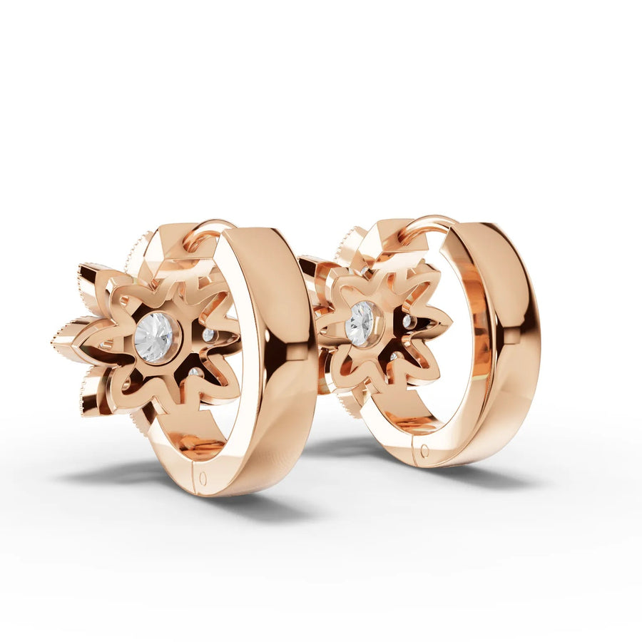 Rose gold floral diamond huggie earrings close-up