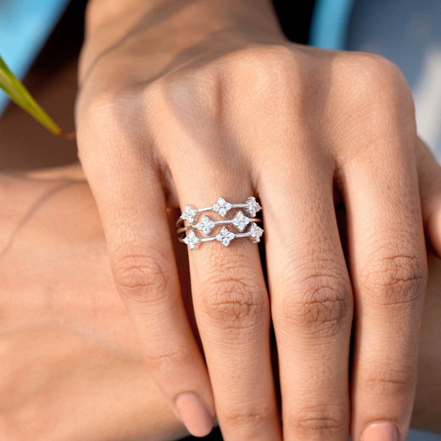 0.62 CT diamond cluster ring set worn on hand