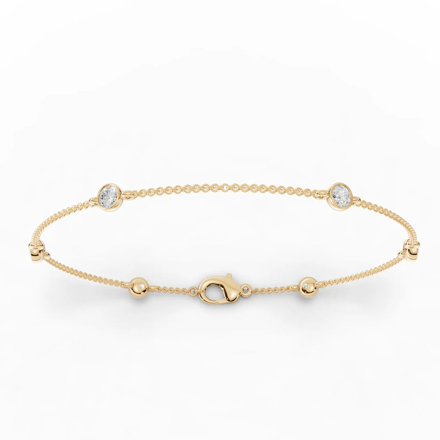 Yellow gold bezel diamond bead bracelet