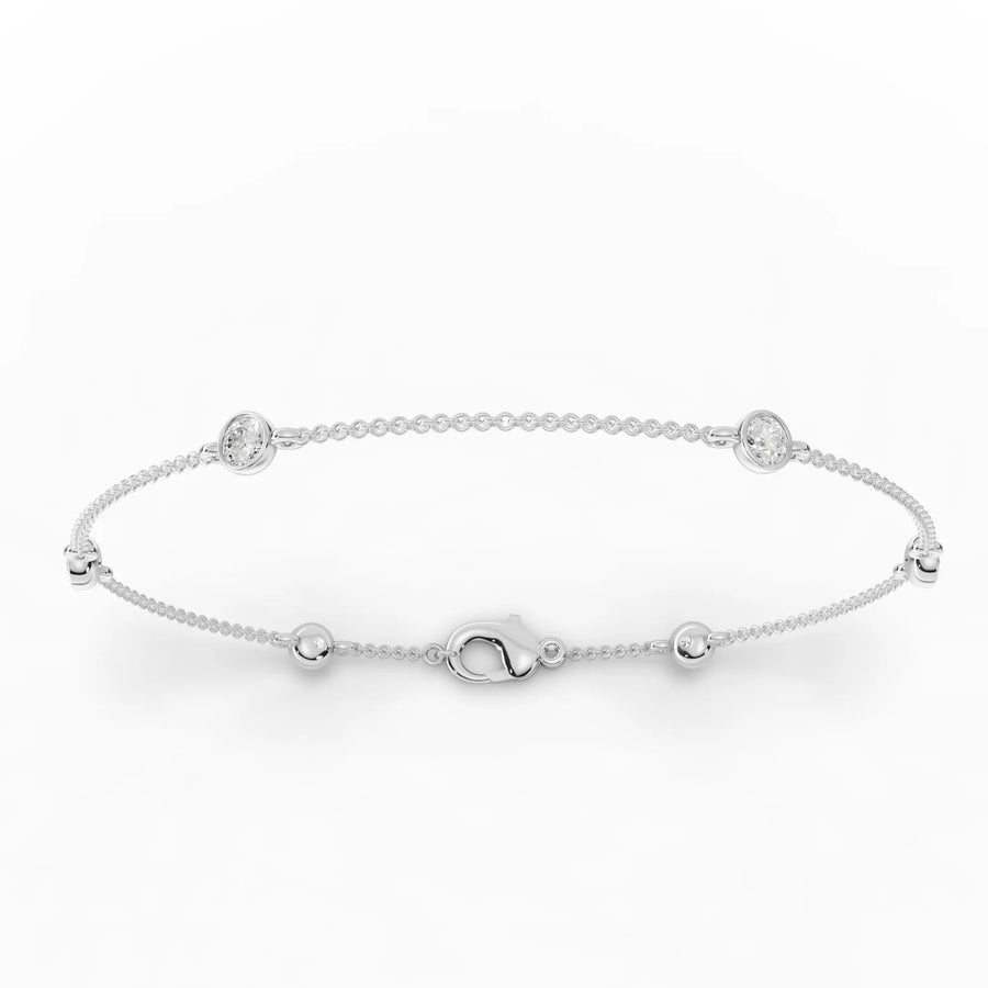 0.60 CT bezel-set lab grown diamond bead chain bracelet in 18k gold with round diamonds and polished bead stations