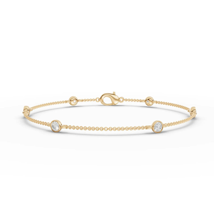 Diamond and bead structure on yellow gold