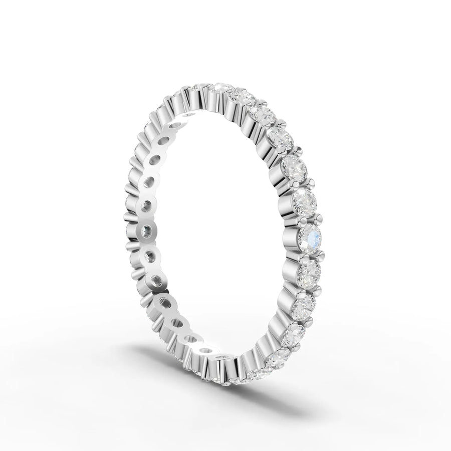 Round cut lab-grown eternity ring white gold close-up