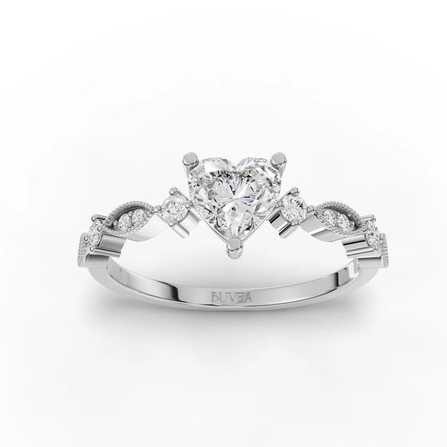 0.88 CT heart lab diamond solitaire ring with round accent stones, tapered band, and milgrain edges