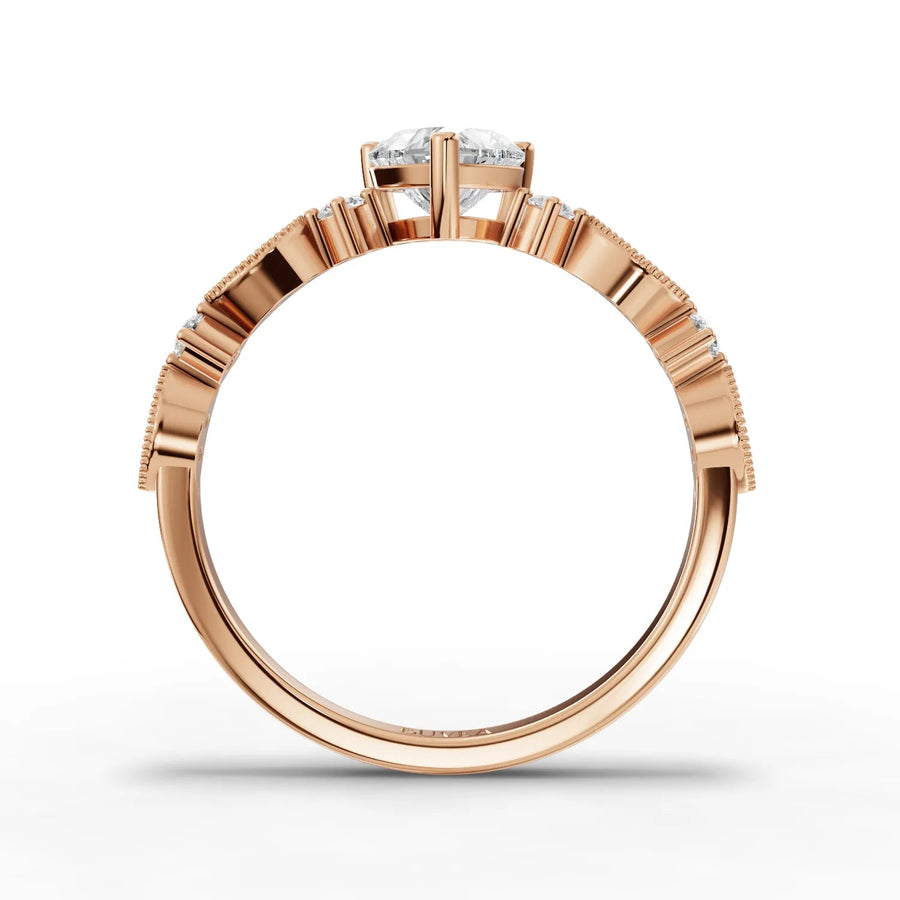 Heart center tapered band ring rose gold close-up