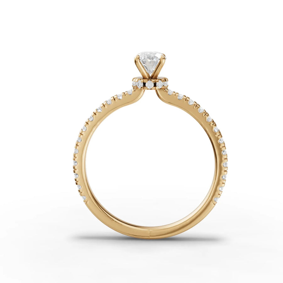 Oval lab-grown diamond ring yellow gold close-up