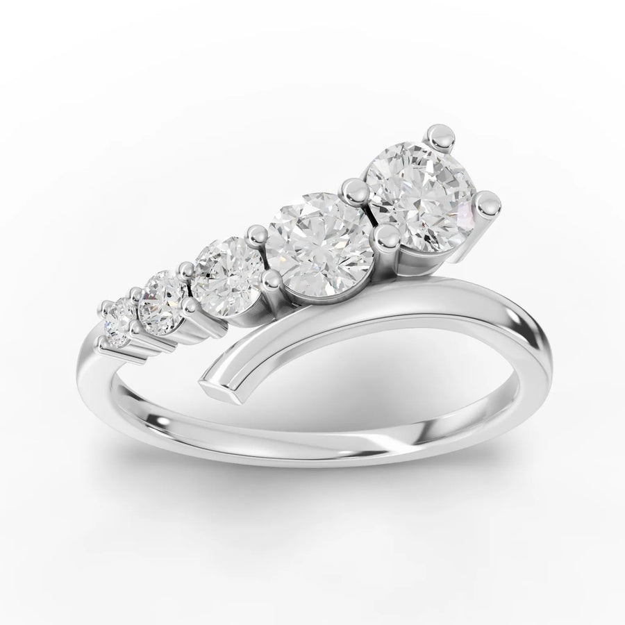 0.77 ct round five stone lab diamond ring in polished gold with graduated prong-set diamonds and curved band