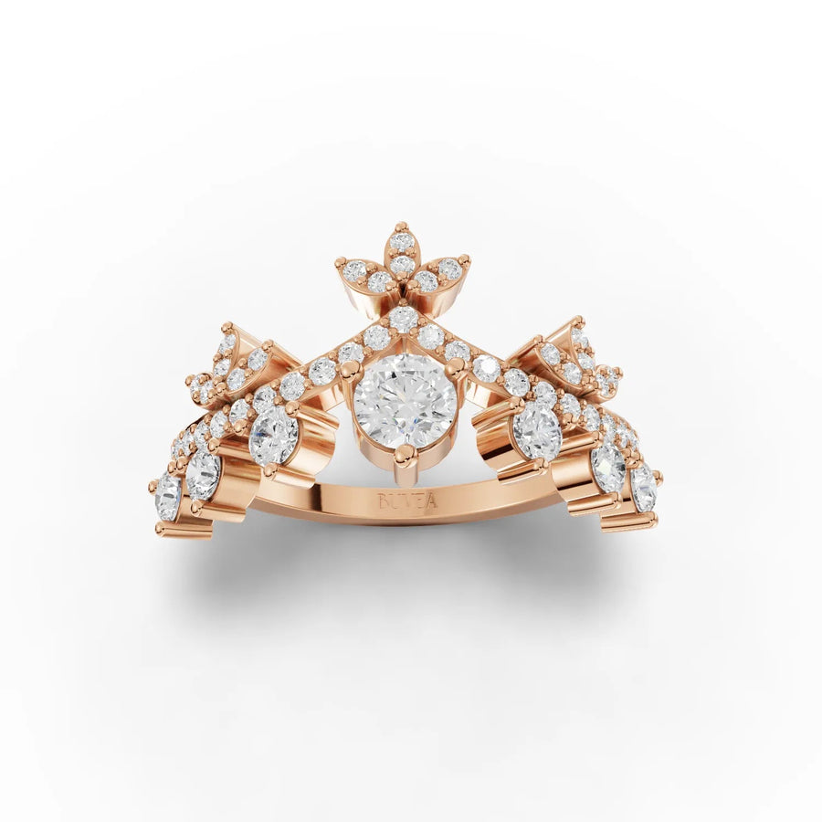 Crown style lab diamond ring in rose gold, featuring a round center stone surrounded by smaller accent diamonds.