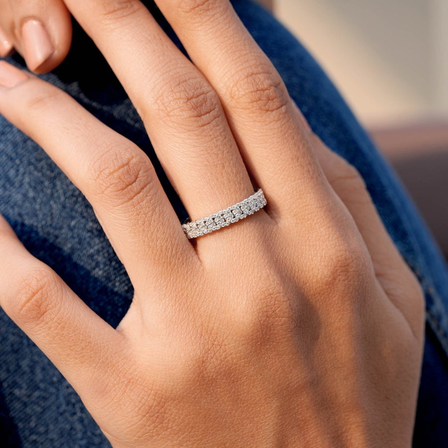 0.90 CT interlocking link diamond ring worn on hand