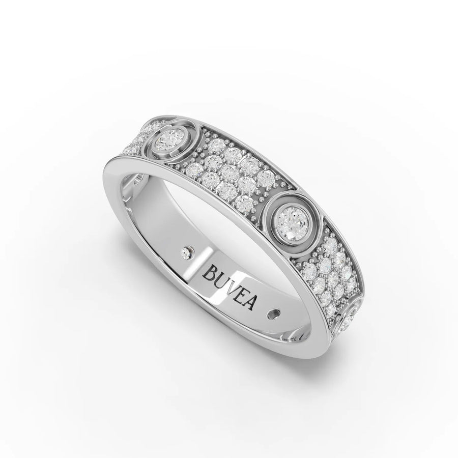 Wide 18K gold band featuring round lab grown diamonds in bezel and pavé settings, offering a polished, structured design.