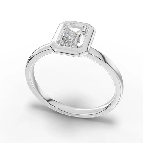 Emerald bezel diamond ring white gold angle
