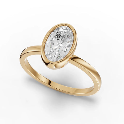 1.00 CT Oval Bezel Solitaire Lab Grown Diamond Ring in yellow gold, angled view