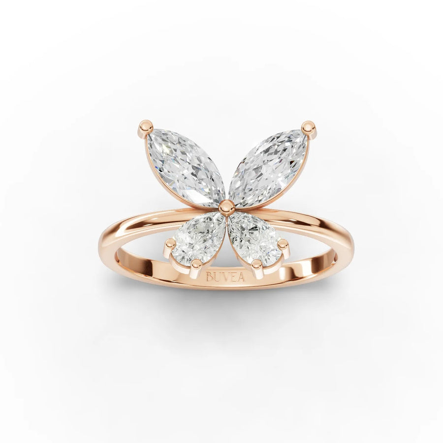 1.01 Ct butterfly lab diamond ring in rose gold, featuring pear and marquise cut diamonds in a four-stone design.