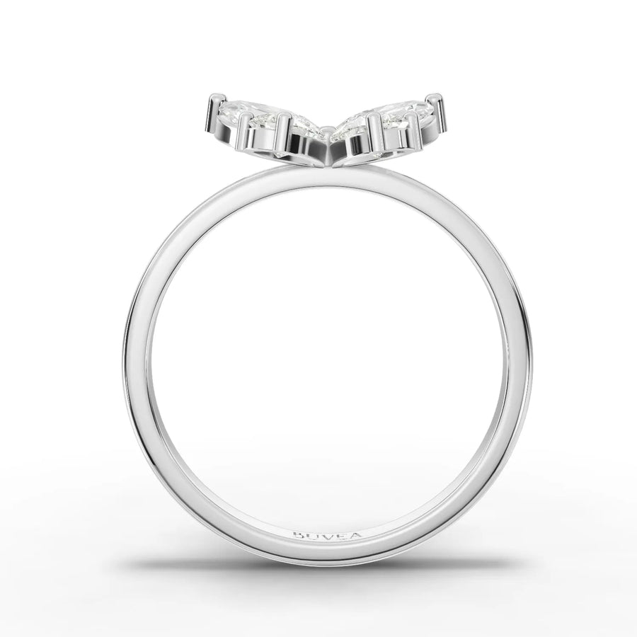 Butterfly lab diamond ring featuring two marquise and two pear-shaped diamonds in a sleek 18k gold band.