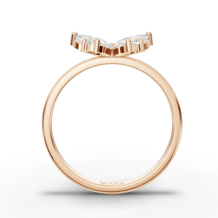 Refined 1.01 Ct butterfly lab diamond ring in 18k gold, featuring two pear and two marquise diamonds in a delicate setting.